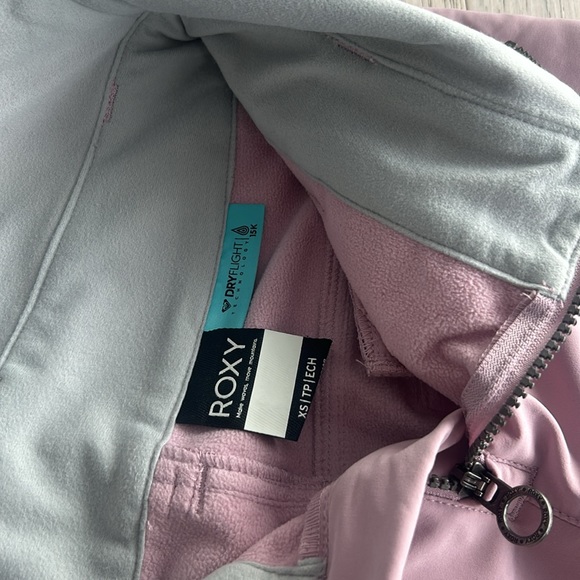 Roxy Women's Summit Bib Pants in pink. - Picture 4 of 9